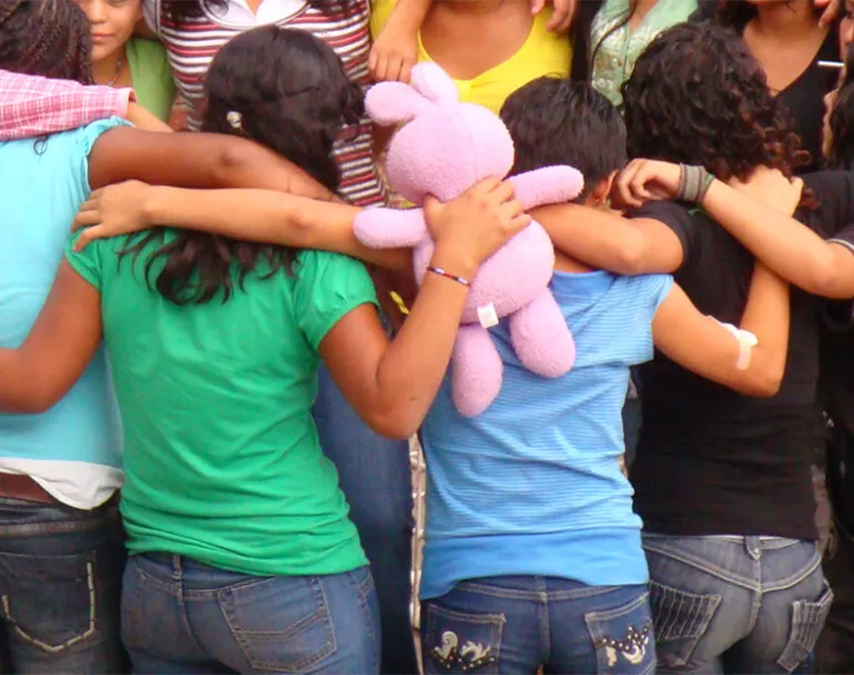 Youth hugging | The issues in Latin America