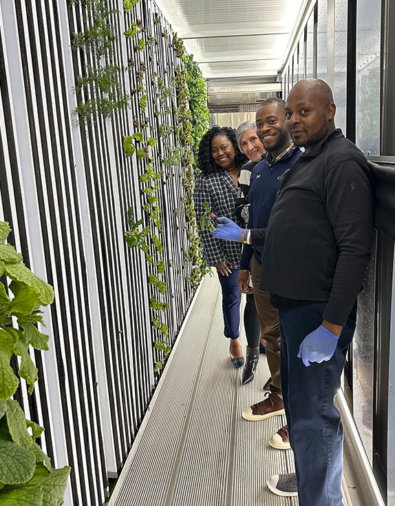 covenant house greater washington staff in hydroponic farm