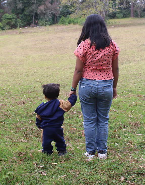 Covenant House Guatemala homeless young mother with her son 