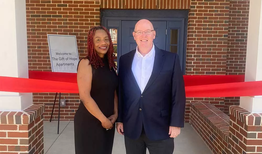 Former CEO Kevin Ryan with Covenant House Atlanta Hero at the celebratory ribbon-cutting marking the completion of the Gift of Hope apartments
