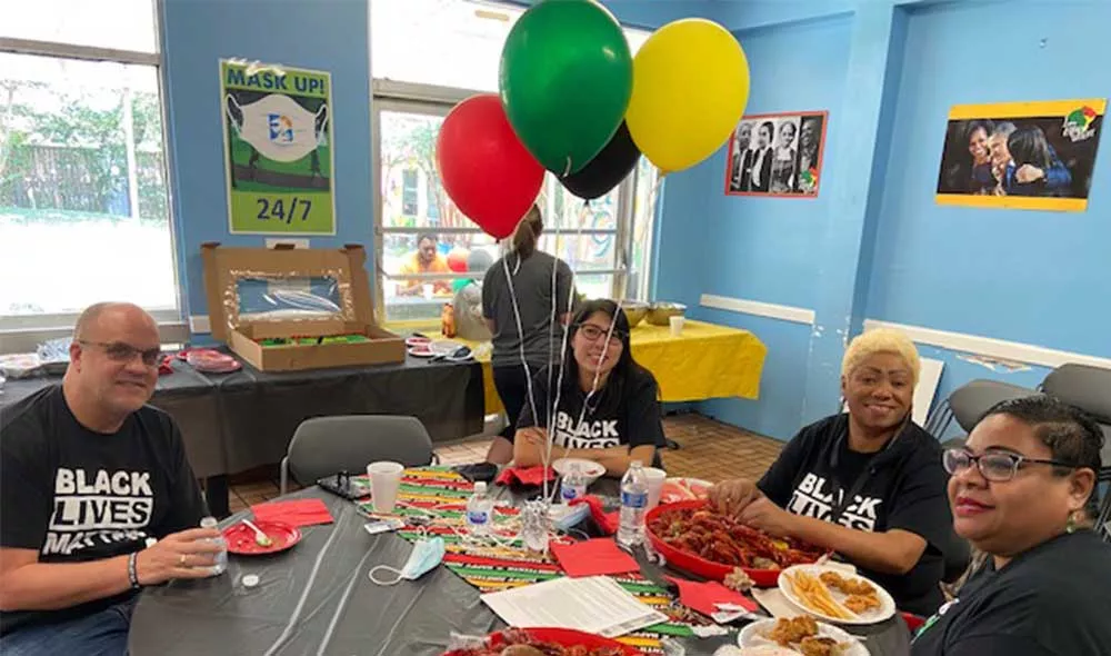 Covenant House Texas Juneteenth party with people dining