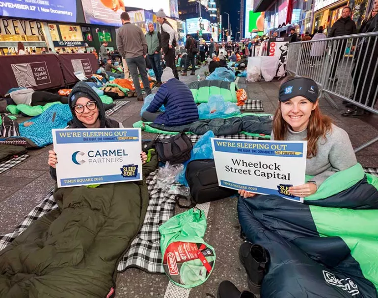 Covenant House Sleep Out volunteers in sleeping bags | Raising funds and awareness for homeless youth