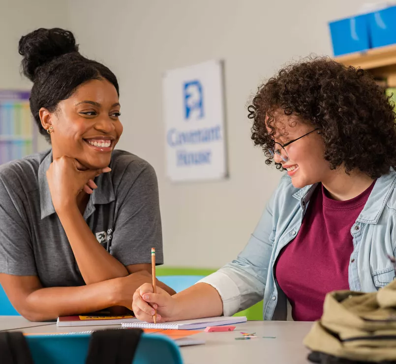 Covenant House staff working at a table